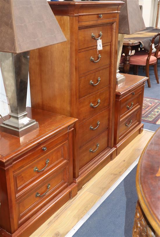 An Ethan Allen tall cherrywood narrow chest, fitted seven drawers and a pair of Ethan Allen two drawer bedside chests tall chest H.134c